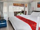 фото отеля Lijiang Free Cloud Guesthouse