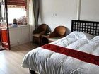 фото отеля Lijiang Free Cloud Guesthouse