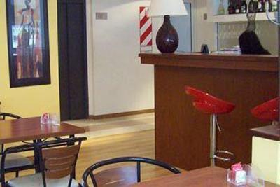 фото отеля Arcangeles Apart & Suites Hotel