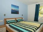 фото отеля Ferienwohnungen Moselstausee