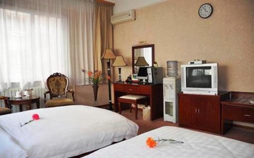 фото отеля Hai Qi Business Hotel