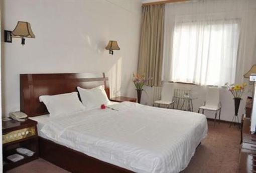 фото отеля Hai Qi Business Hotel