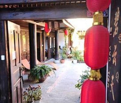 фото отеля Blue Skies Inn - Lijiang