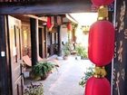 фото отеля Blue Skies Inn - Lijiang