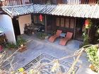 фото отеля Blue Skies Inn - Lijiang