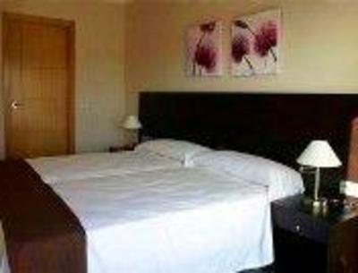 фото отеля Apartamentos Turisticos Playa de Tapia