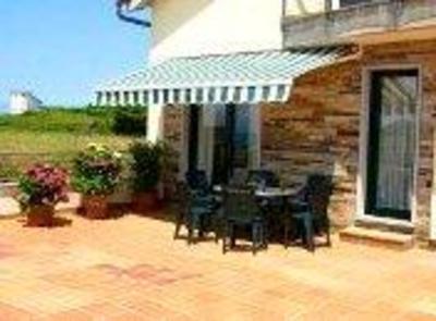 фото отеля Apartamentos Turisticos Playa de Tapia