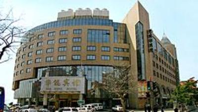 фото отеля Qingdao Huaneng Hotel