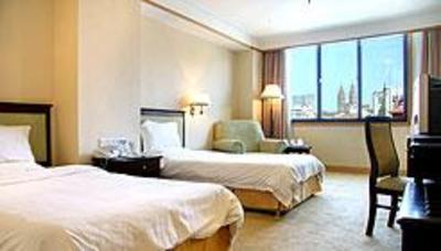 фото отеля Qingdao Huaneng Hotel