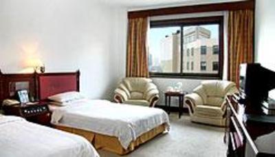 фото отеля Qingdao Huaneng Hotel