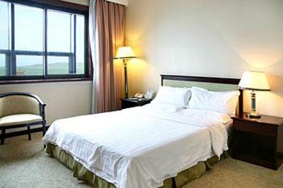 фото отеля Qingdao Huaneng Hotel