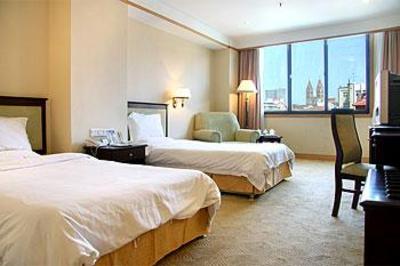 фото отеля Qingdao Huaneng Hotel