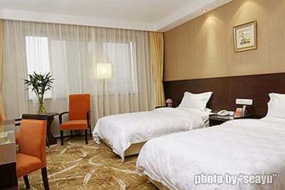 фото отеля Qingdao Huaneng Hotel