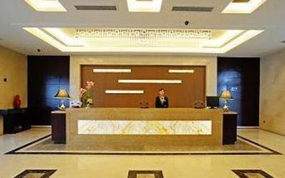фото отеля Yangzhou Ziteng Business Hotel