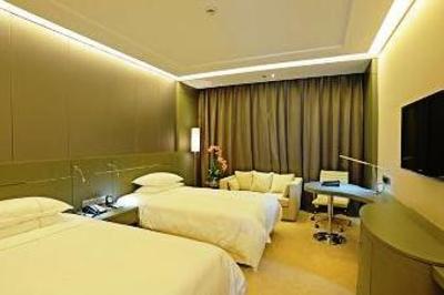 фото отеля Yangzhou Ziteng Business Hotel