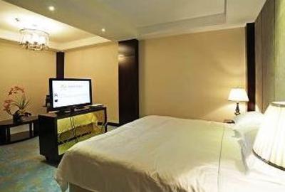 фото отеля Yangzhou Ziteng Business Hotel