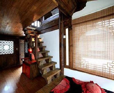 фото отеля Lijiang Lize Graceland Artistic Suite Inn