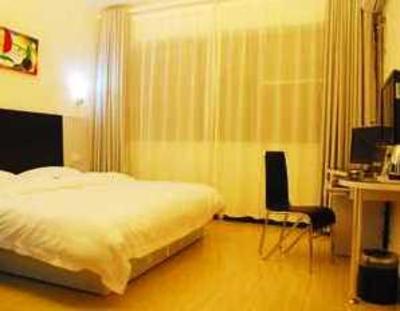 фото отеля Changsha Xin Qing Inns