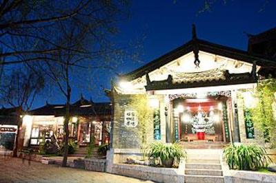 фото отеля Zhengfu Caotang Inn Shuxiangmendi Lijiang