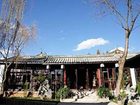 фото отеля Zhengfu Caotang Inn Shuxiangmendi Lijiang
