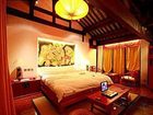 фото отеля Zhengfu Caotang Inn Shuxiangmendi Lijiang