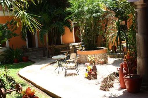 фото отеля Hotel Casa de las Flores