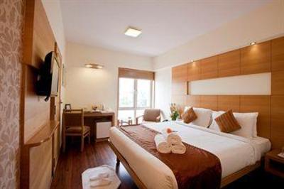 фото отеля Coraltree Hotel Bangalore