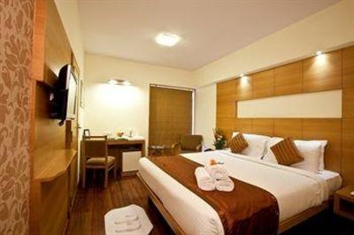 фото отеля Coraltree Hotel Bangalore