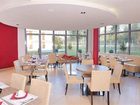 фото отеля Residhome Appart Hotel Paris Guyancourt