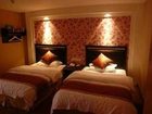 фото отеля Xinhao Hotel