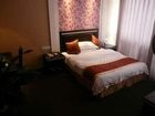 фото отеля Xinhao Hotel