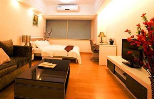 фото отеля She & He Hotel Apartment Guangzhou Jinxiu