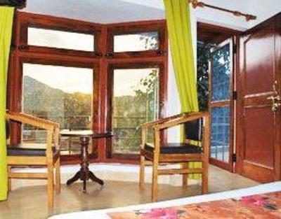 фото отеля Manoram View Hotel Naukuchiatal
