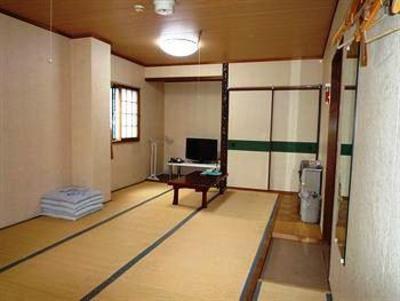 фото отеля Tommy Rich Inn Kyoto