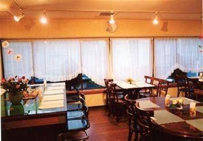 фото отеля Tommy Rich Inn Kyoto