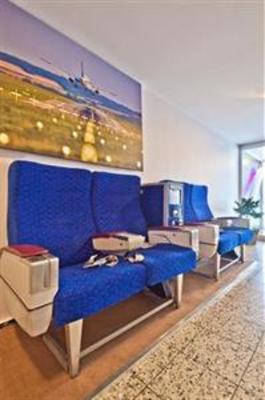 фото отеля Hotel Schuemann Garni am Airport