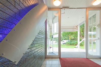 фото отеля Hotel Schuemann Garni am Airport
