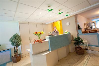 фото отеля Hotel Schuemann Garni am Airport