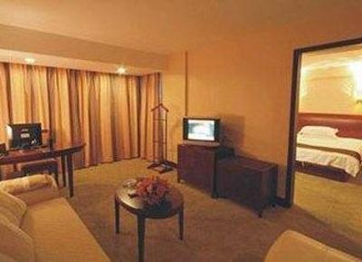 фото отеля Gangcheng Commerce Hotel