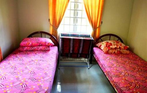 фото отеля Homestay Air Manis