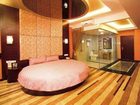 фото отеля Sihai Commercial Hotel