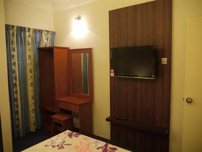 фото отеля Camellia Budget Inn