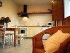 фото отеля Apartamentos La Cruz de Paderne Navia