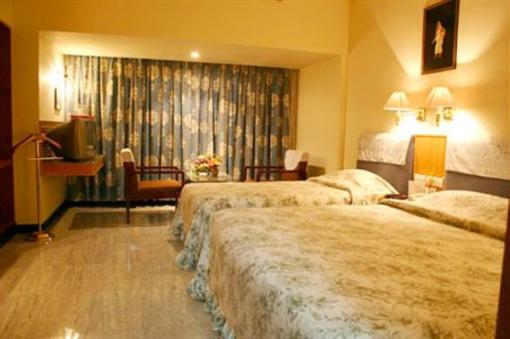 фото отеля Hotel Parisutham