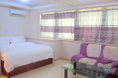 фото отеля Dalian Kaixuan International Hotel Residence