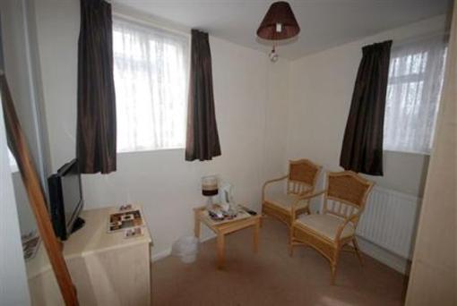 фото отеля Whitecliff Guest House