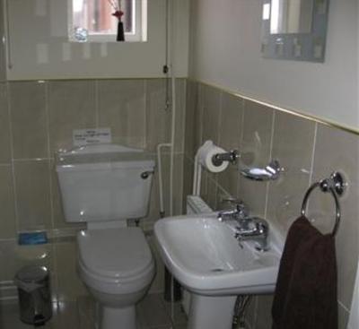 фото отеля Whitecliff Guest House