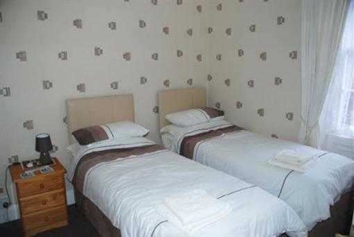 фото отеля Whitecliff Guest House