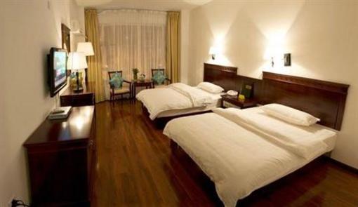 фото отеля Dali Home In Orchid Hotel