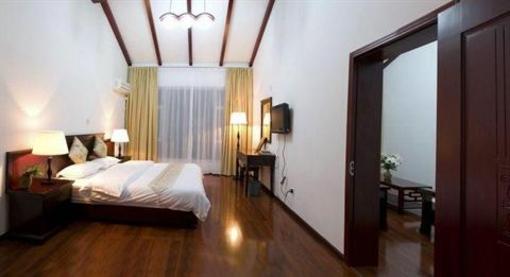 фото отеля Dali Home In Orchid Hotel